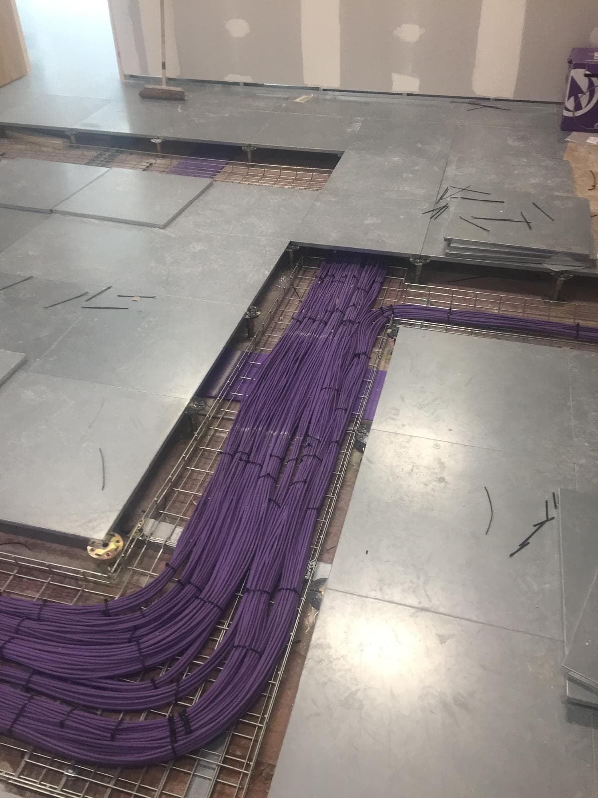Neat underfloor wiring showing attention to detail